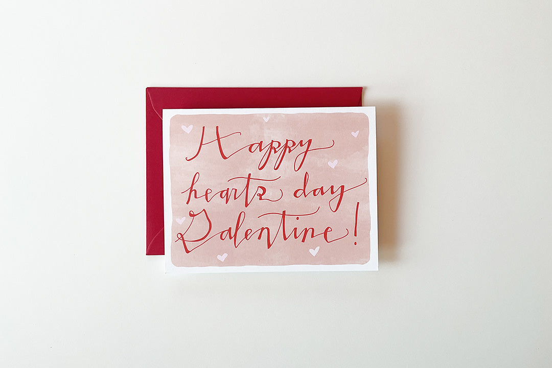 Valentine's Day card with red envelope on a white background